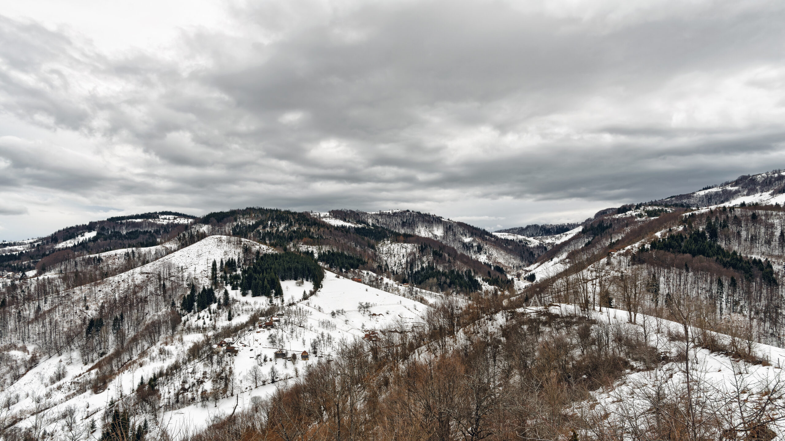 Mountain Zlatibor, Serbia at winter. Beautiful landscape in winter, a snow-covered mountain, dramatic cloudy sky.